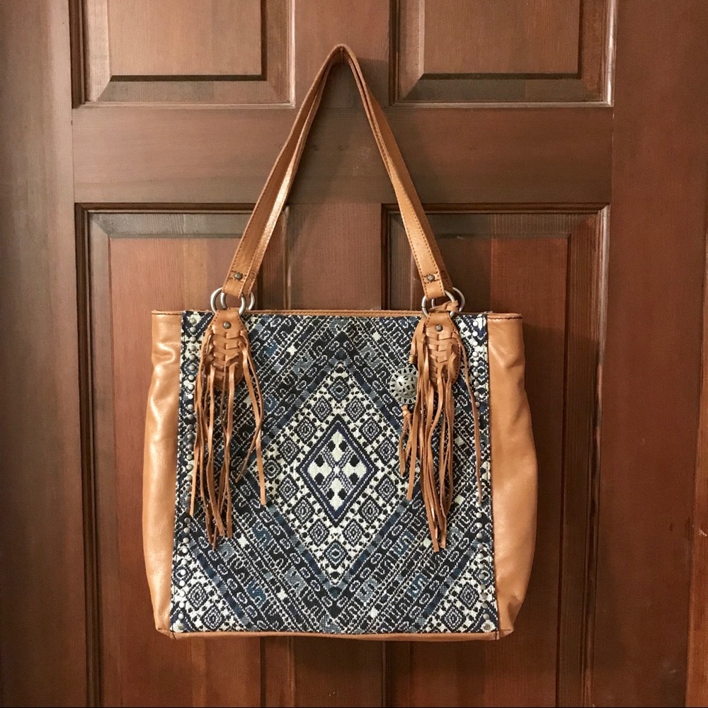 The Sak Leather and Textile Handbag